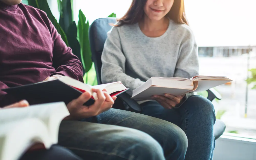 group-young-people-sitting-enjoyed-reading-books-together