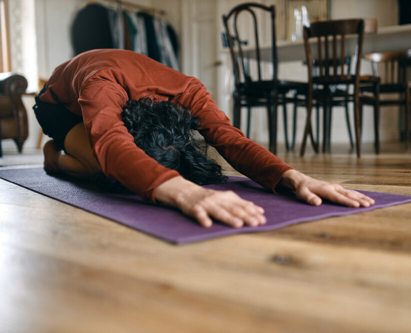 Short curly black hair coach with moustache and beard teach young woman in  sportswear how to do lord of the dance yoga pose Cardio machines are on th  Stock Photo  Alamy